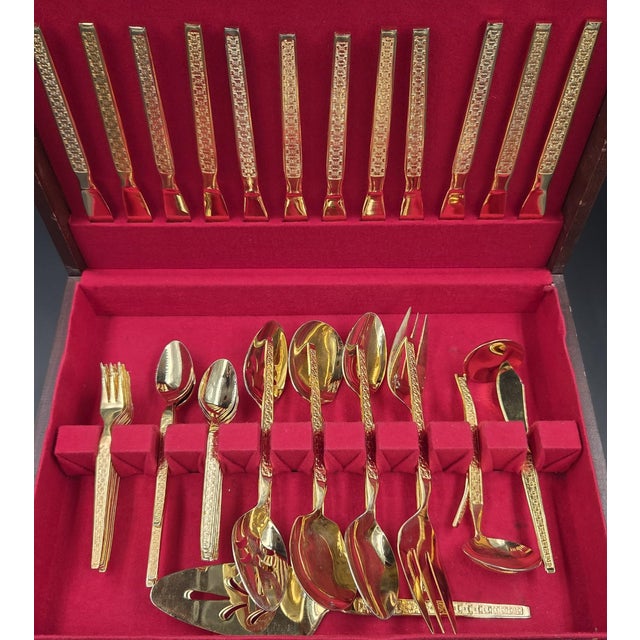 ​This luxurious vintage gold electroplated collection features the sophisticated "Trocadero" pattern by Stainless Korea,...