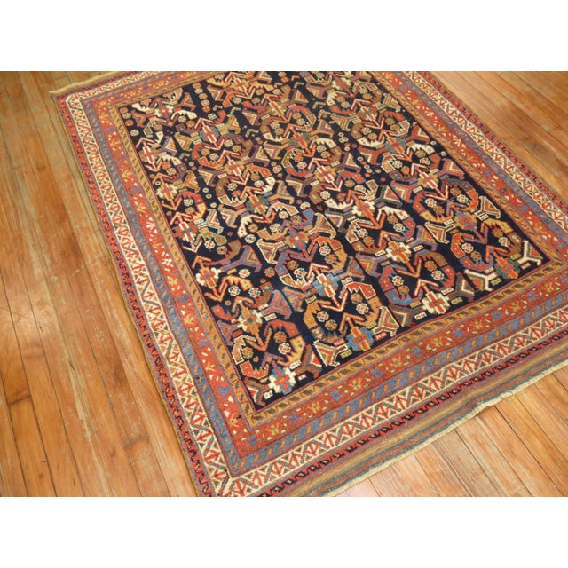 An early 20th century Persian Tribal Afshar rug Measures: 4'3" x 5'8" High-quality antique Afshar rugs display deeply...