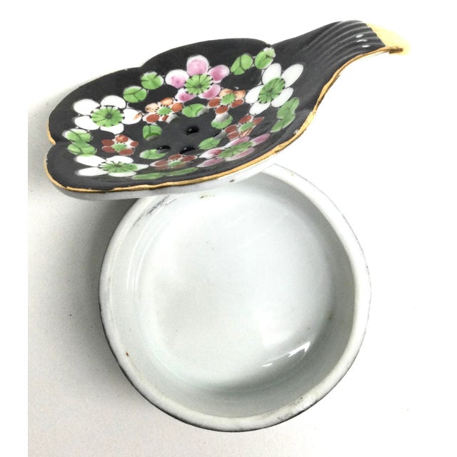 Small but really packs a punch. Hand painted flowers on this cool 2 pc set. Never have tea again without this cool...