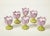 After 18th century models; each decorated with red petals and a green base. Sold individually.