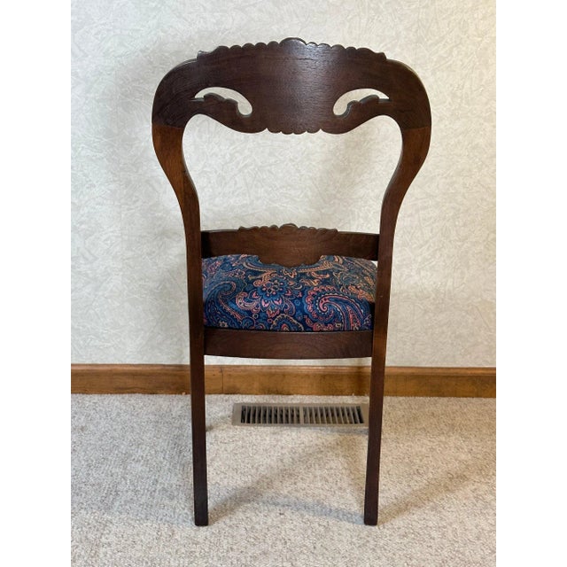 Time-Tested Beauty: Pair of 19th Century Balloon Back Side Chairs Uncover the splendor of the past with this pair of 19th-...