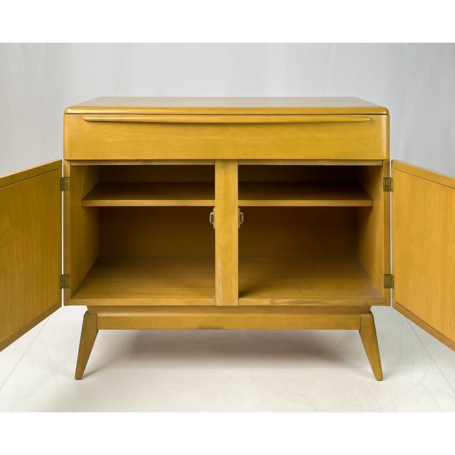 Authentic Mid-Century Modern server / credenza manufactured by Heywood-Wakefield in 1964. Crafted from solid birch wood...
