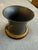 A vintage Gucci desk pen holder crafted in Italy, featuring a sculptural flared pewter vessel with turned side accents...