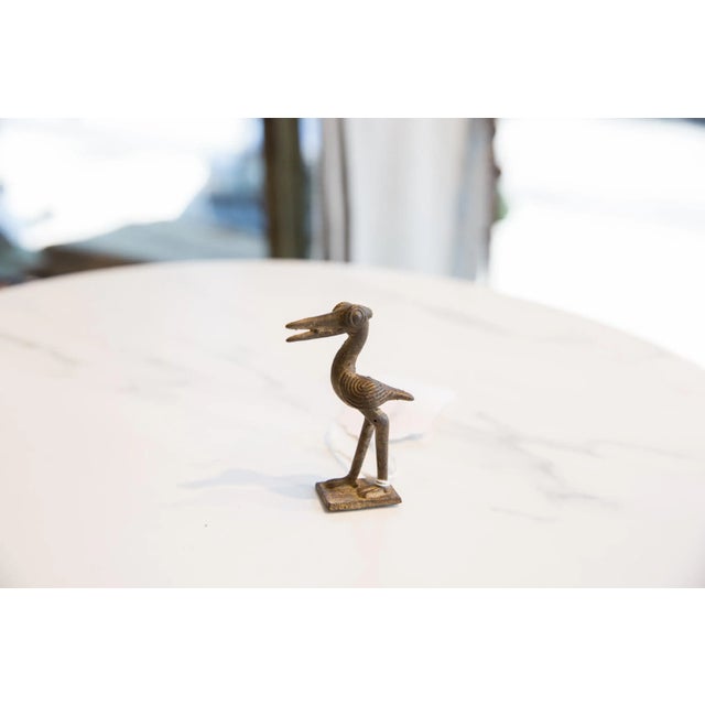 :: Vintage handmade African dark bronze stork. Circa mid 20th century and possibly older, this piece has such incredible...