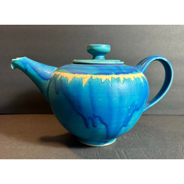 Stunning blue drip glaze stoneware studio pottery teapot. Artisan signed on the bottom. New, unused condition.