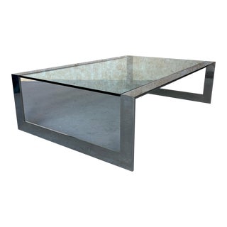Sleek 1970's Polished Steel and Glass Coffee Table For Sale