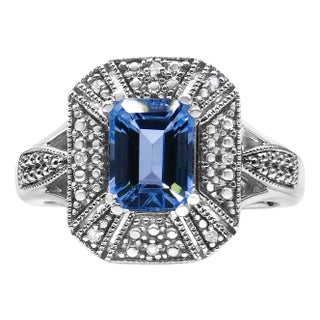 .925 Sterling Silver Diamond Accent and 8X6 mm Emerald-Shape Blue Topaz Ring (I-J Color, I2-I3 Clarity) - Ring Size 9 For Sale