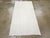 A vintage Turkish flatweave Kilim throw rug handmade during the mid-20th century in white. Measures: 3' 0" x 5' 11"