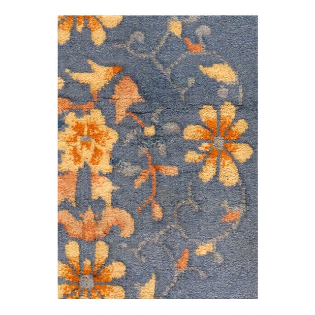 Beautiful antique Art Deco Chinese hand-knotted wool rug with a Beige field. This Chinese rug has a Navy blue frame and...