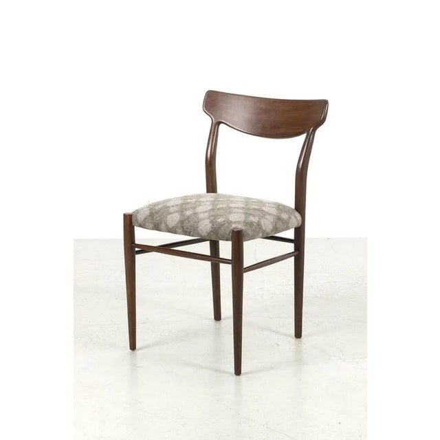 Beautiful set of 5 german lübke model 603 chairs that were designed by gustav herkströter. The chairs have new upholstery...