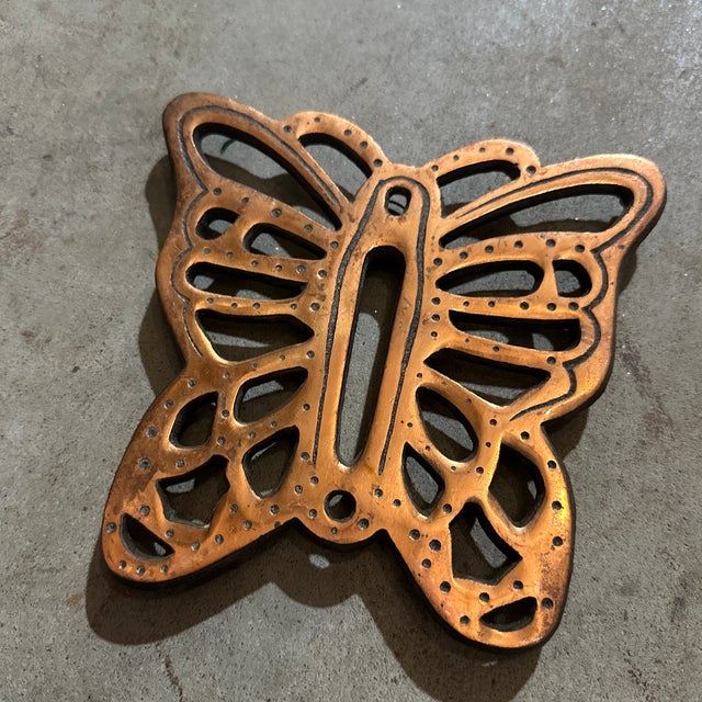 Up for consideration is a beautiful vintage butterfly trivet with a copper finish. This would look lovely in your home and...