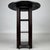 A distinctive early 20th-century English side table, finely crafted from oak and distinguished by its unusual combination...
