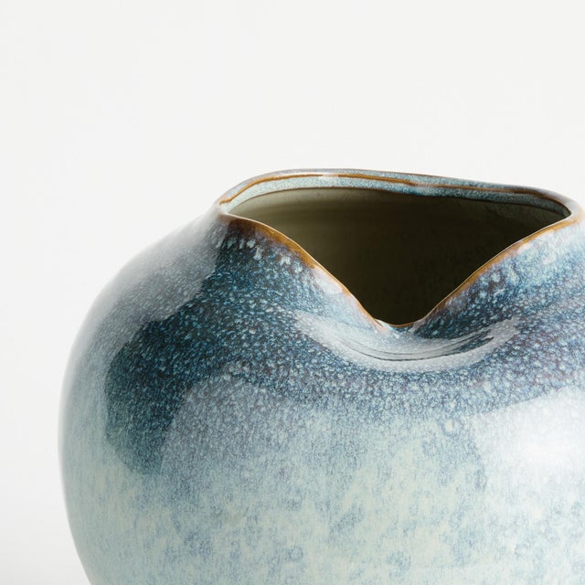 Beautifully sculpted with an indentation at the opening which adds a unique opportunity for a sculptural stem. Finished...