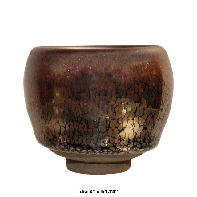 This is a nicely handmade teacup in metallic black and bronze marks finish. ( 2 pieces per purchase ) In Jianyang, Jiankou...