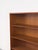 Teak bookcase designed by B. Mogensen for Søborg Møbelfabrik. Inside, there are three adjustable shelves with beveled...