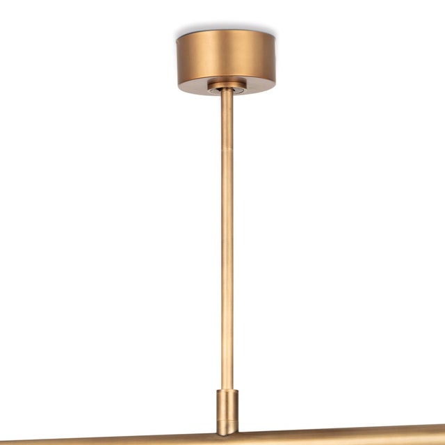 Four arms swivel around a center point on our modern, linear Wick Chandelier. Create a unique, dynamic design in your...