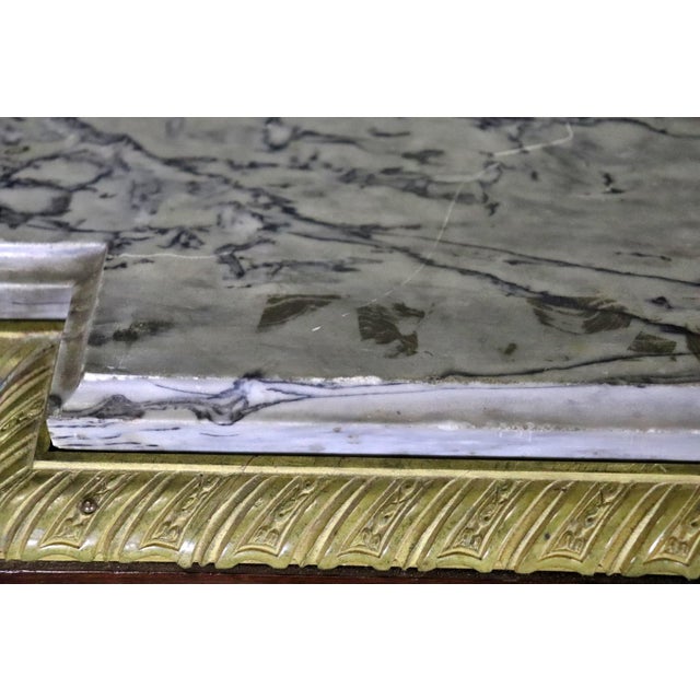 Enhance your home décor with this exquisite 19th Century Louis XVI Style French Marble Top Server with Wedgwood Plaque, a...