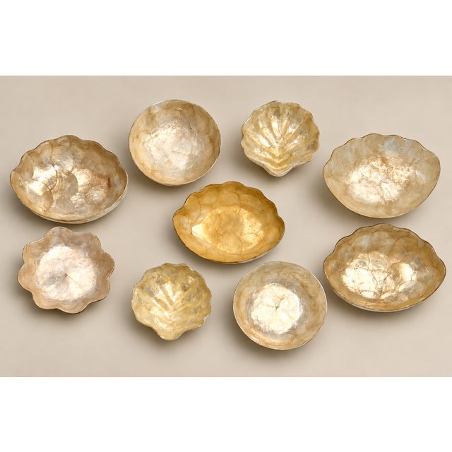 Iconic Mid-Century Gump’s capiz bowls and scalloped shell dishes, 9-piece set—iridescent shell finishes with elegant,...