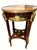 An elegant matched pair of early 20th-century Louis XV Revival salon or occasional tables, circa 1900–1920. Each table...