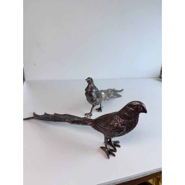 A plated pair of pheasants that makes for sophisticated decor. Use these as part of your harvest table display. single...
