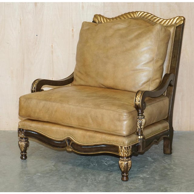 We are delighted to offer for sale this very large, hand made, Italian giltwood, tan brown leather throne style armchair...