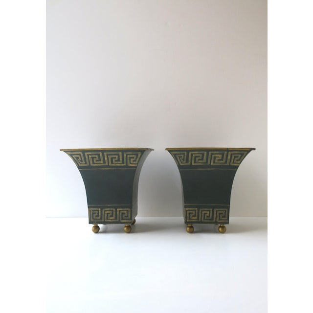An Italian pair of dark green and gold Greek-Key tôle metal planters potholders cachepots jardinières, circa mid to...