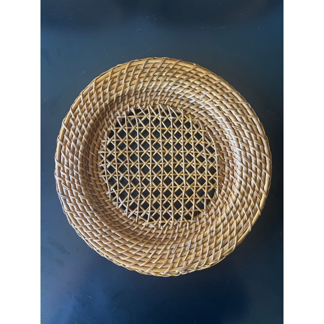 A beautiful set of eight vintage 1970s handwoven rattan and cane charger placemats with wonderful natural warmth and...