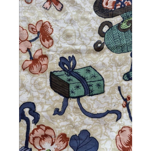 Elegant custom hand-printed linen featuring a refined chinoiserie composition of urns, butterflies, and stylized florals....