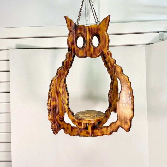 This is an amazing fine. We have here a 1970s Folk Art Burnt Pine Hanging Planter. The artist crafted the planter in the...