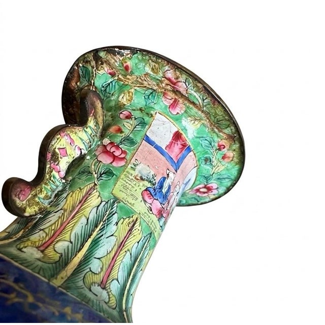A charming, matched pair of 19th-century Chinese Canton enamel on copper miniature baluster-form vases. Masterfully hand-...