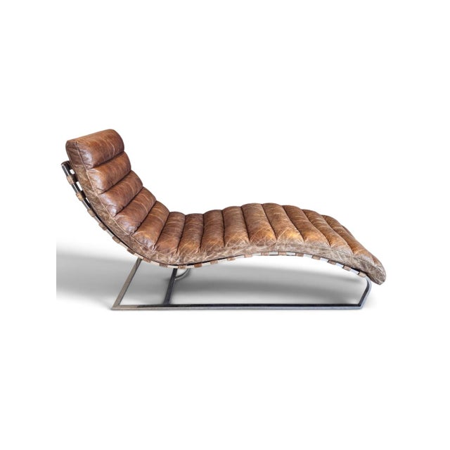 A striking blend of refined craftsmanship and industrial-inspired design, this contemporary chaise lounge by Timothy...