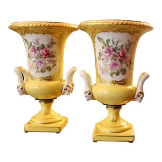 Pair of Paris Porcelain Yellow Glazed and Gilt Urns For Sale