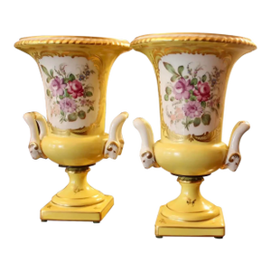 Pair of Paris Porcelain Yellow Glazed and Gilt Urns