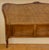 Elegant French Louis XV-style headboard crafted in walnut, featuring a beautifully curved silhouette and a decorative...