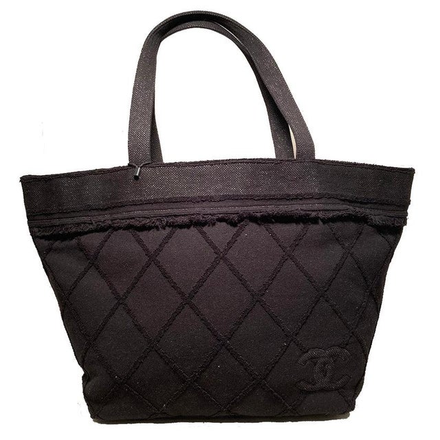 Chanel Black Canvas Raw Edge Tote Bag in excellent condition. Black woven canvas exterior with raw fringe edge canvas...