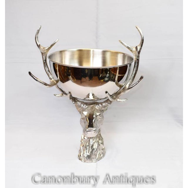 - Amazing and eye catching silver plate fruit / champagne / wine cooler - Stands on the distinctive stags bust support...