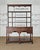 A striking antique oak dresser featuring a classic open plate rack above a generous dresser base. Rich oak grain, turned...