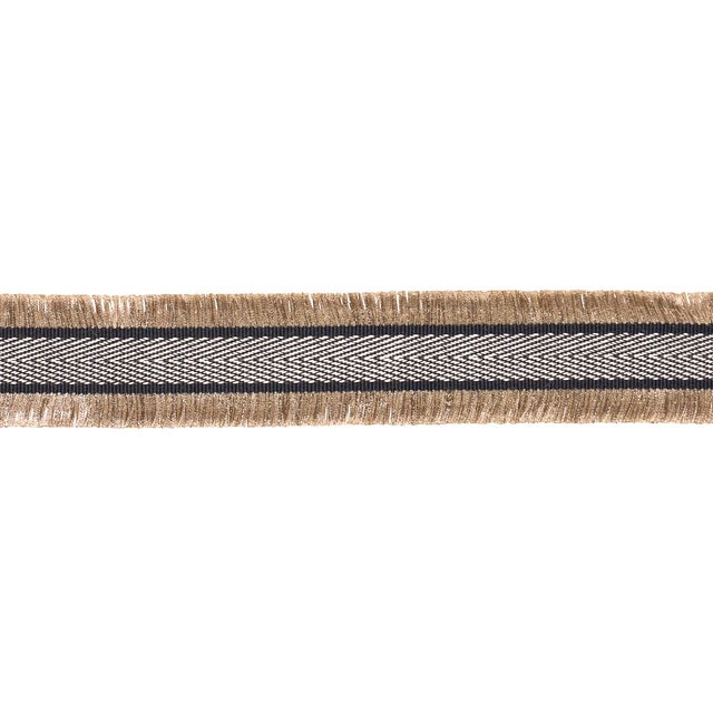 A stylish chevron tape with fringed edges, Felicity Fringe Trim adds extraordinary style, texture, and movement to...