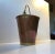 Bucket shaped planter in solid copper and brass. The copper has developed a deep red/pink patina. It was manufactured by...
