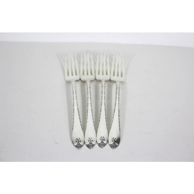 Set of 4 silver plated dinner forks from 1940. Stamped on the back: Wm. Rogers Company IS Exquisite. This is the Exquisite...