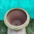 Handcrafted of glazed terra cotta. Contemporary shape handcrafted from terracotta this planter brightens the deck or patio...