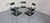 Set of 5 minimalist, chrome-plated chairs by Ernst Lauclair for Girsberger from the 1960s. Seats in black Skai...