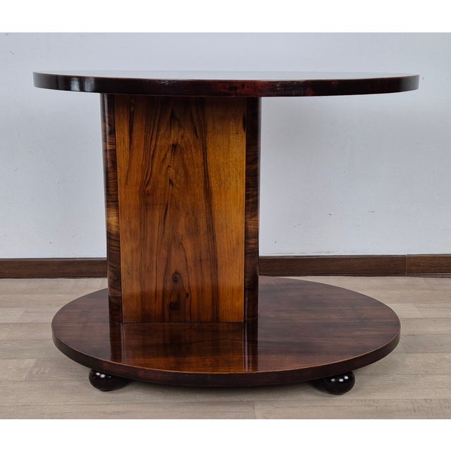 Spectacular Futurist Art Deco coffee table in walnut burl, walnut crotch, and rosewood. Rosewood profiles and legs. Two...