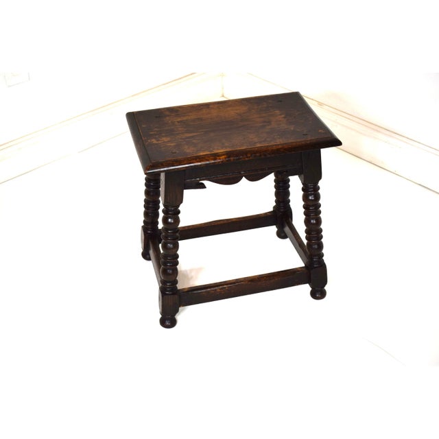Late 19th-Century-Early 20th-Century English Joined Stool--made of solid oak--pegged construction, shaped skirt, and...