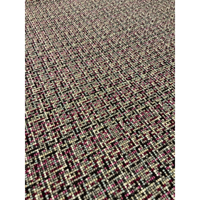 This multipurpose from Romo can add a subtle pop of color to any room. It has a tiny square pattern and a black, pink,...