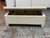 Design Plus Gallery presents an Upholstered Storage Bench from West Elm. The bench is upholstered in linen weave natural...