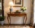 A beautifully crafted Baker Milling Road flip-top game table showcasing richly figured burl walnut veneers and graceful...