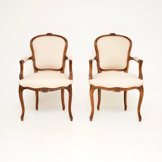 A beautiful pair of antique French walnut salon armchairs, dating from around the 1930’s. The quality is fantastic, the...