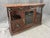 This 19th Century Continental oak buffet features a richly carved case with barley-twist supports, decorative brass...