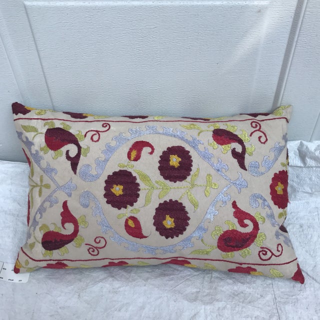 Custom made pillow from a vintage hand-embroidered cotton/silk suzani quilt purchased at the Grand Bazaar in Istanbul,...